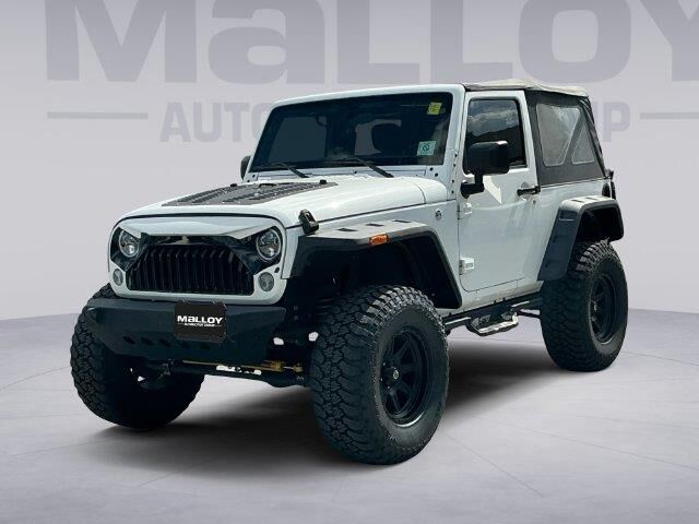 2016 Jeep Wrangler Sport — photo 1 of 13