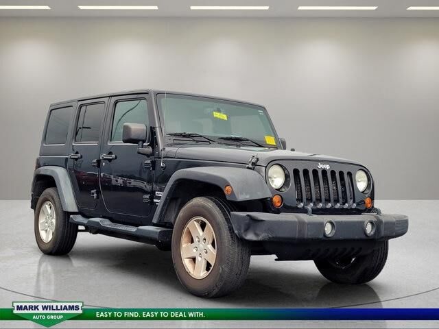 2013 Jeep Wrangler Unlimited Sport — photo 1 of 13