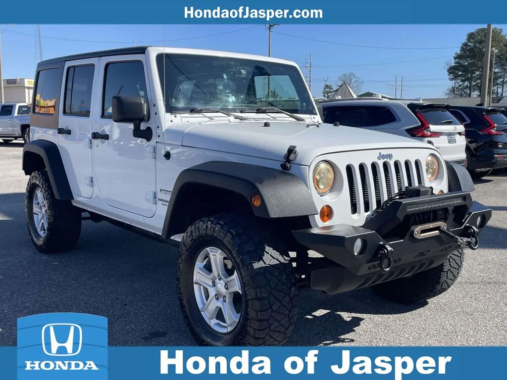 2013 Jeep Wrangler Unlimited Sport — photo 1 of 13