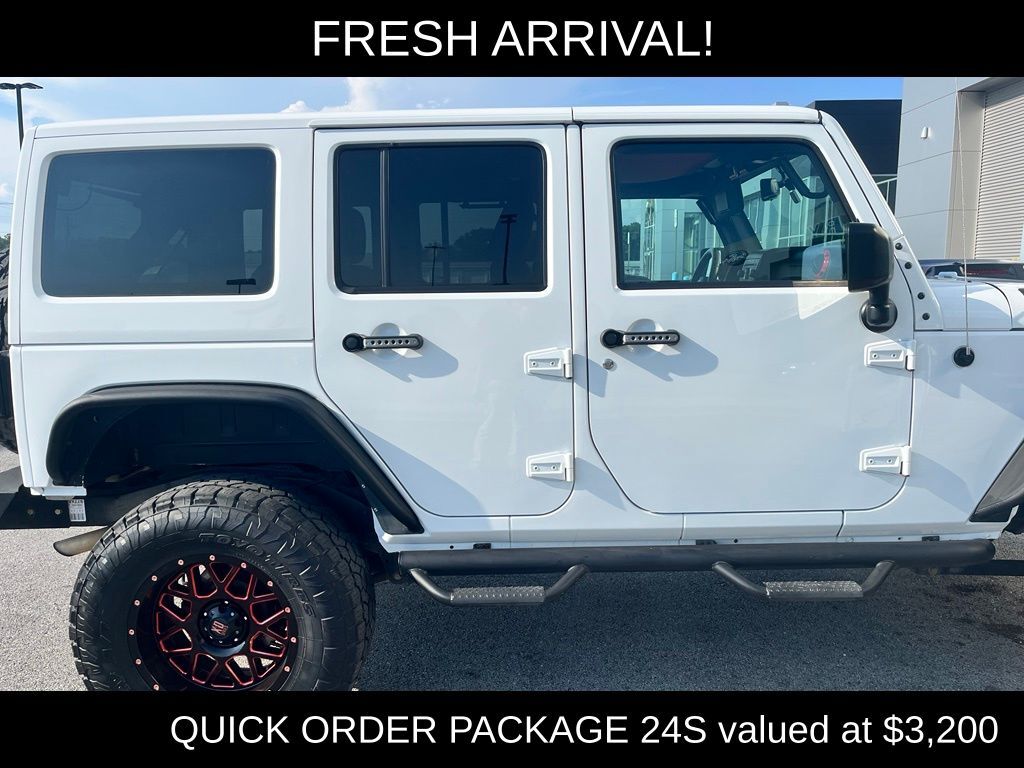 2017 Jeep Wrangler Unlimited Unlimited Sport — photo 1 of 13