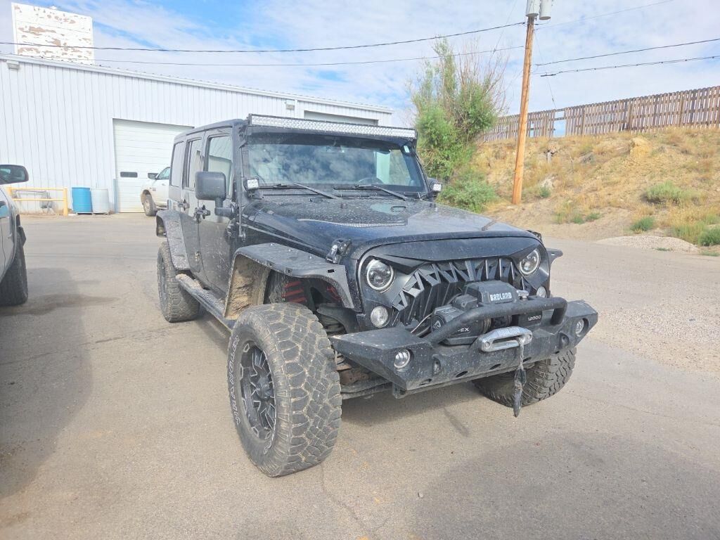 2014 Jeep Wrangler Unlimited Sport — photo 1 of 13