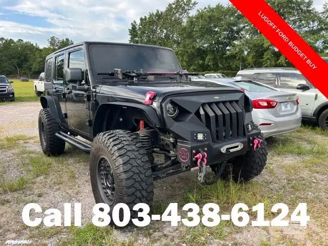 2013 Jeep Wrangler Unlimited Sport — photo 1 of 4