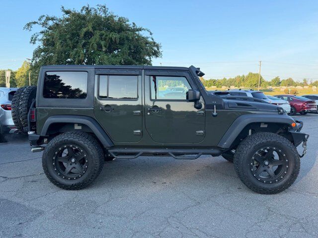 2016 Jeep Wrangler Unlimited Black Bear — photo 1 of 1