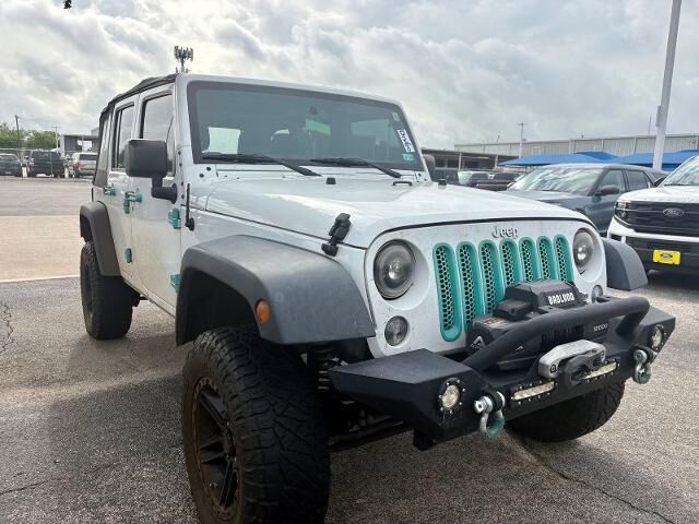 2016 Jeep Wrangler Unlimited Sport — photo 1 of 13