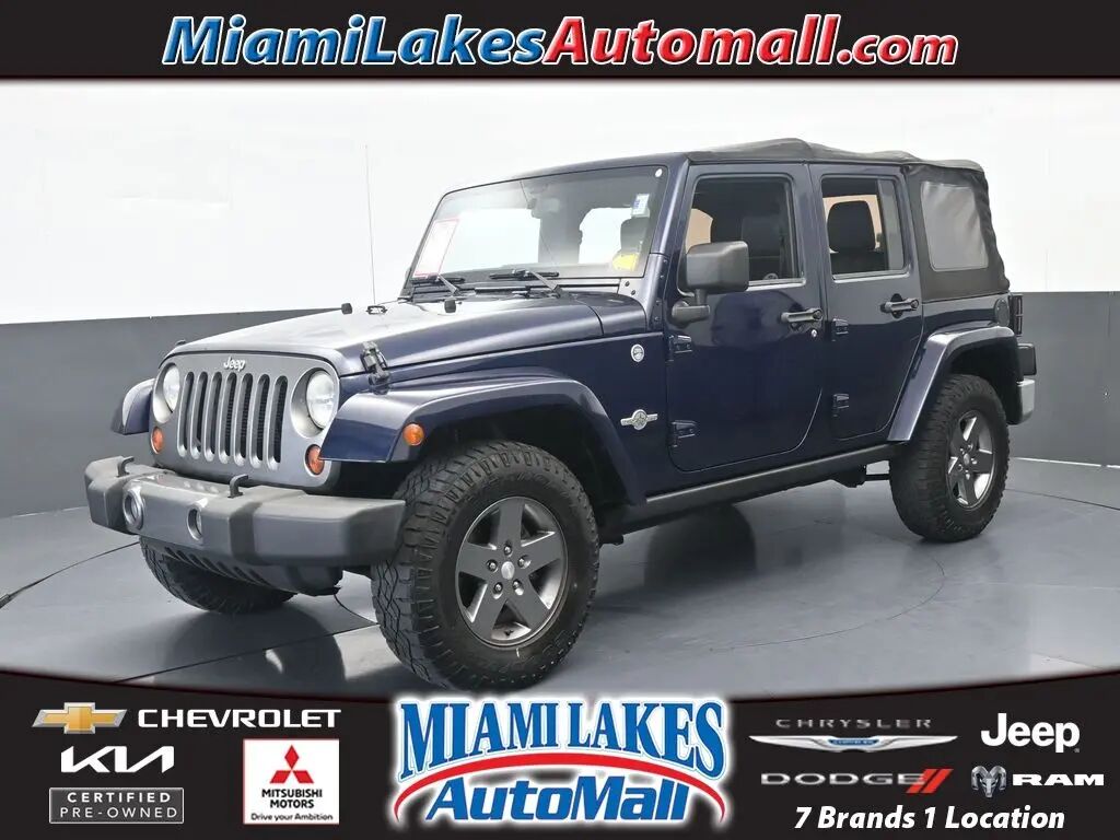 2013 Jeep Wrangler Unlimited Sport — photo 1 of 13