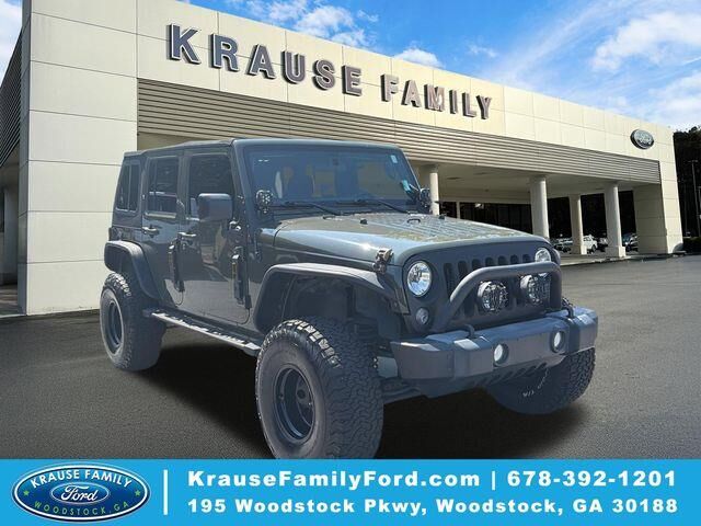 2015 Jeep Wrangler Unlimited Sport — photo 1 of 13