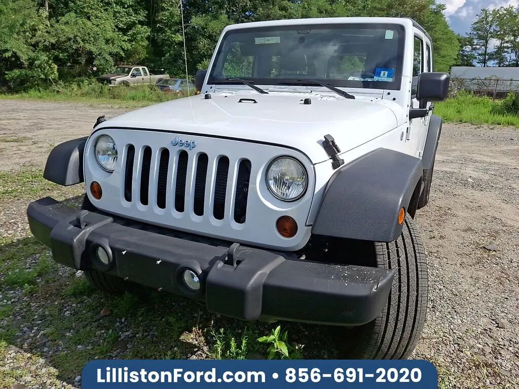 2013 Jeep Wrangler Unlimited Sport — photo 1 of 13