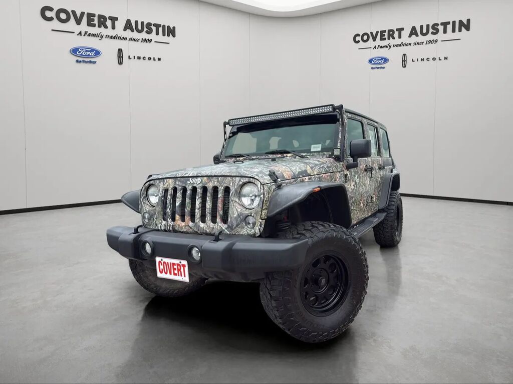 2014 Jeep Wrangler Unlimited Sport — photo 1 of 13