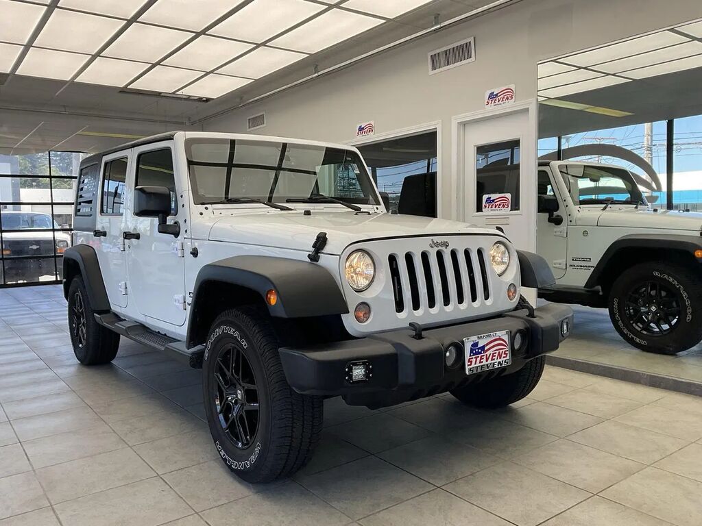 2016 Jeep Wrangler Unlimited Sport — photo 1 of 13