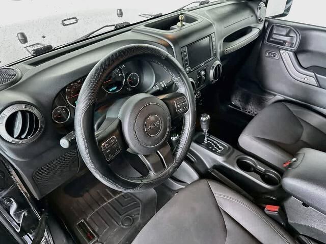 2017 Jeep Wrangler Unlimited Sport — photo 1 of 12