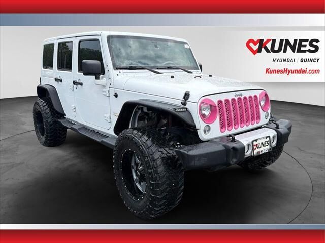 2014 Jeep Wrangler Unlimited Sahara — photo 1 of 13