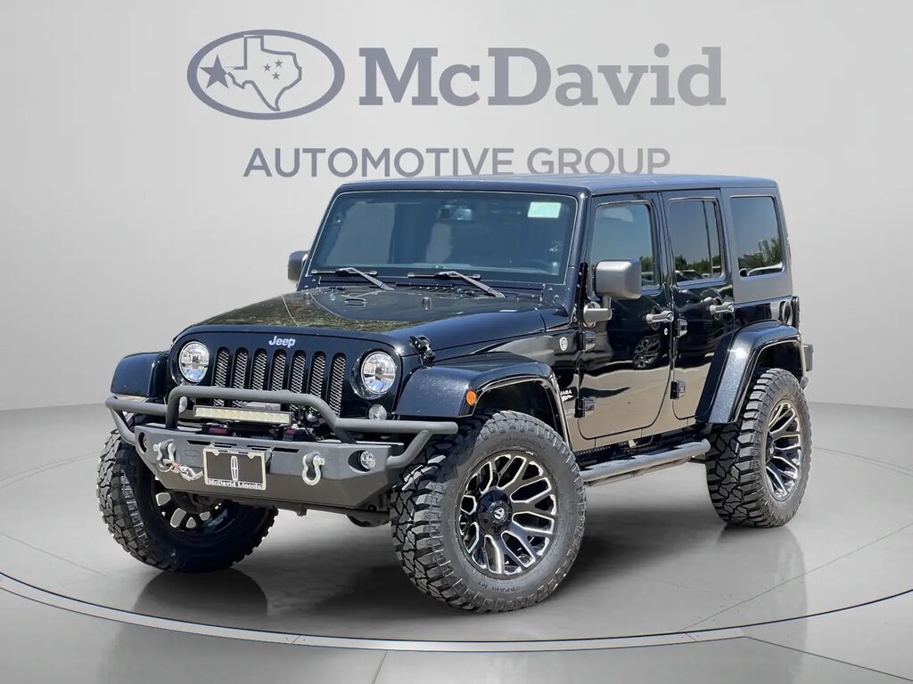 2014 Jeep Wrangler Unlimited Sahara — photo 1 of 12
