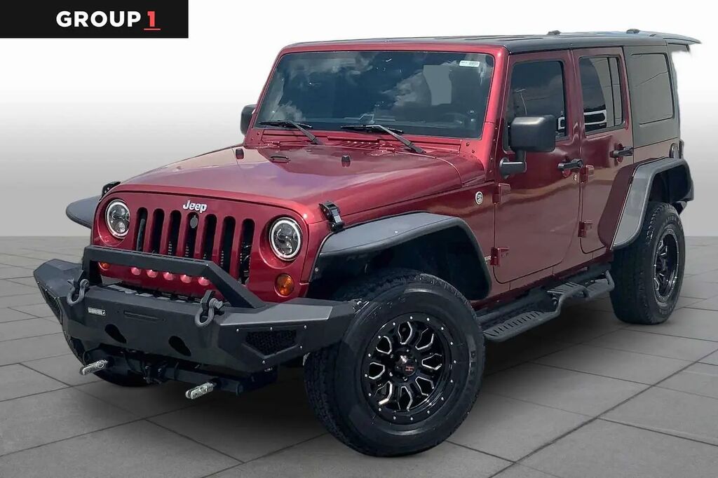 2012 Jeep Wrangler Unlimited Sport — photo 1 of 13