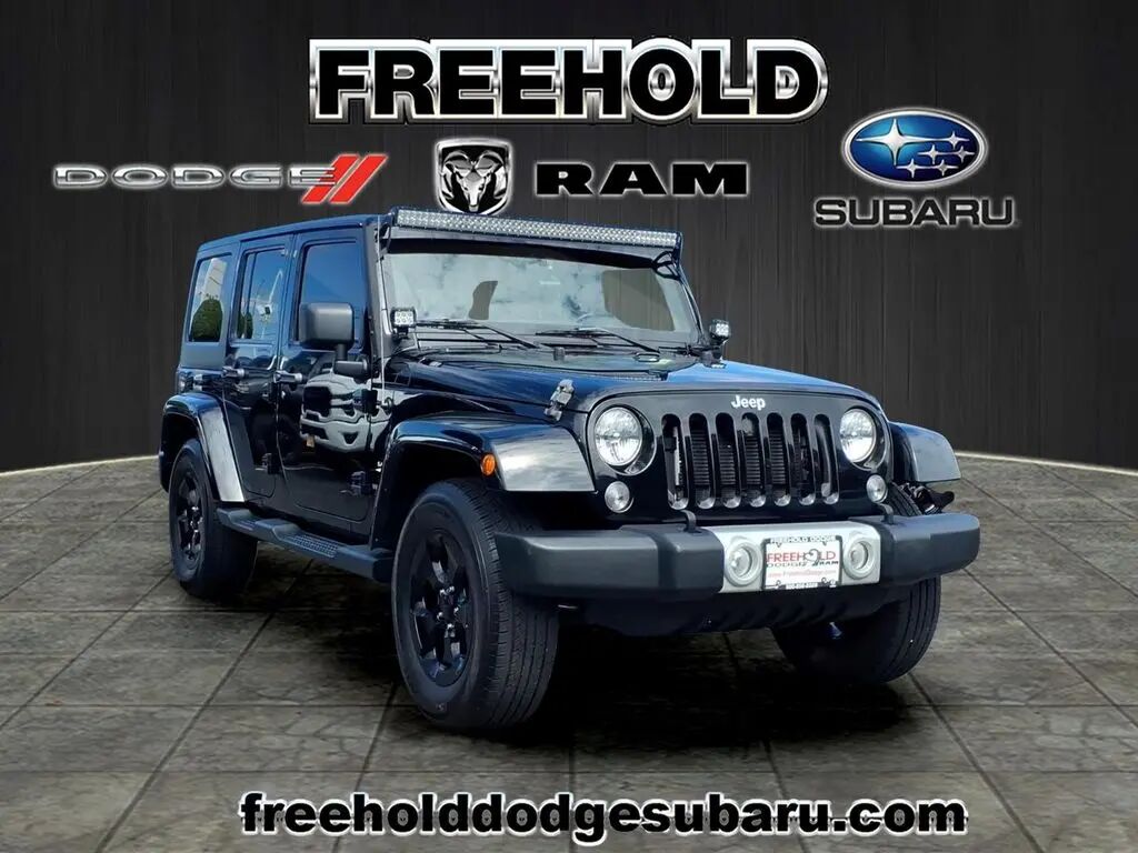 2014 Jeep Wrangler Unlimited Sahara — photo 1 of 13