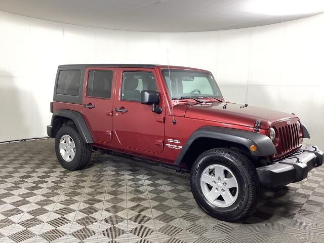 2011 Jeep Wrangler Unlimited Sport — photo 1 of 13