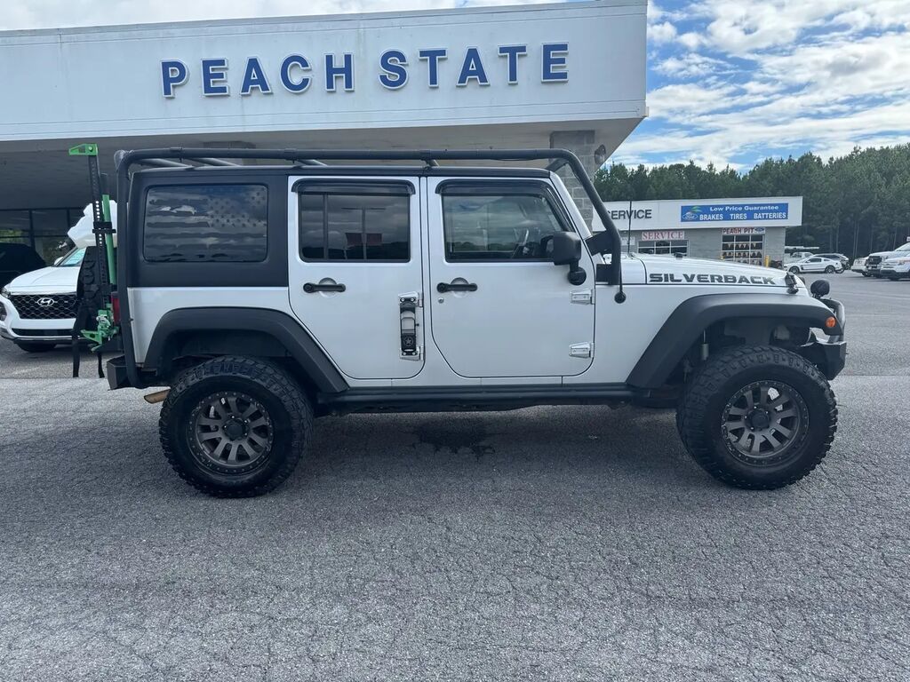 2011 Jeep Wrangler Unlimited Sport — photo 1 of 13