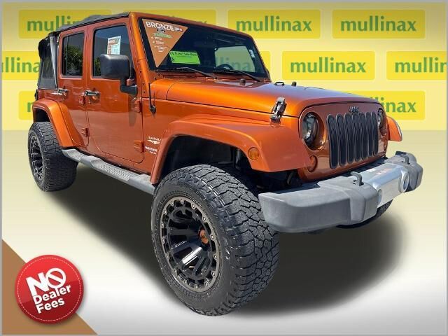 2011 Jeep Wrangler Unlimited Sahara — photo 1 of 13