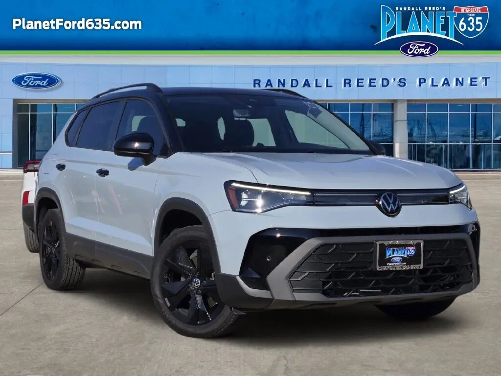 2025 Volkswagen Taos SE Black — photo 1 of 13