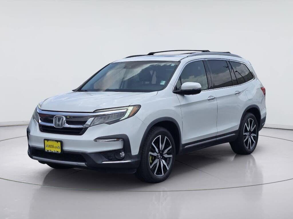 2021 Honda Pilot Touring w/Rear Captain's Chairs — photo 1 of 1