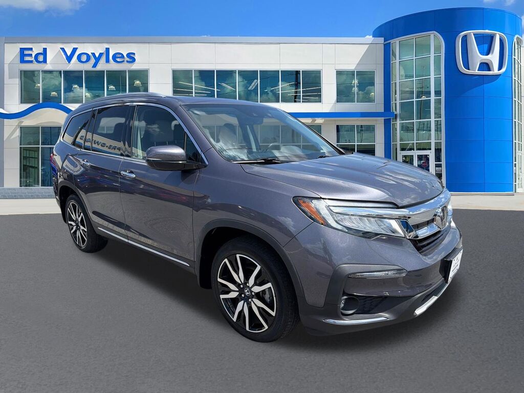 2022 Honda Pilot AWD TRG 7P — photo 1 of 7