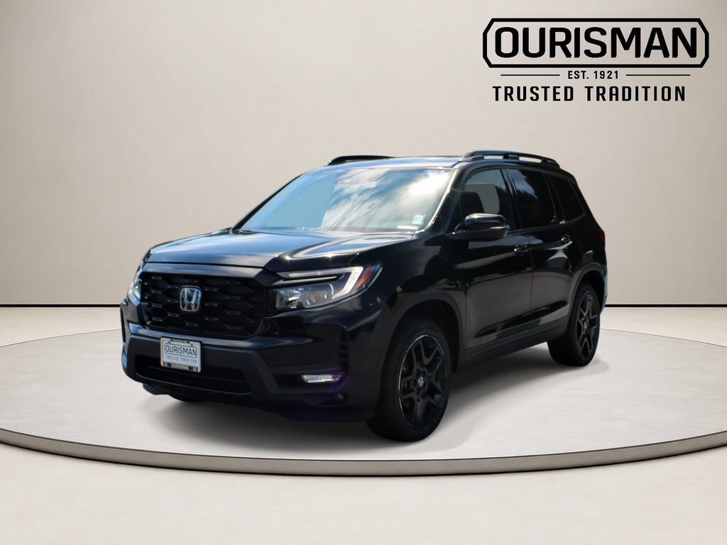 2023 Honda Passport AWD ELITE — photo 1 of 6
