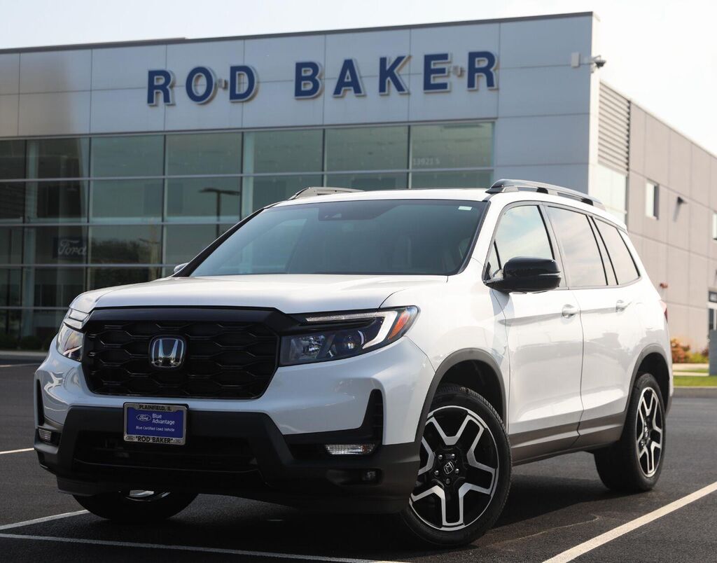 2023 Honda Passport Elite — photo 1 of 27