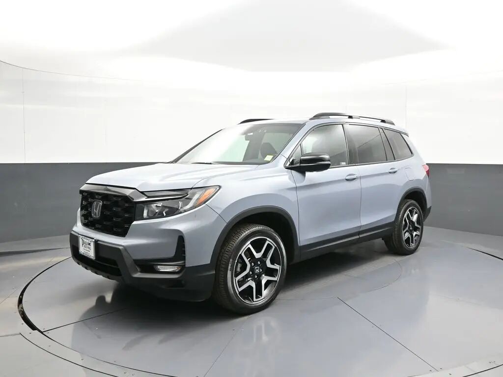 2023 Honda Passport Elite — photo 1 of 12