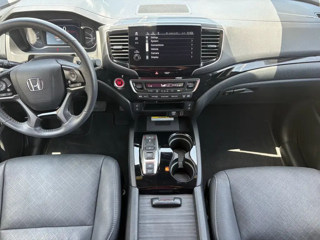 2023 Honda Passport Elite — photo 1 of 13