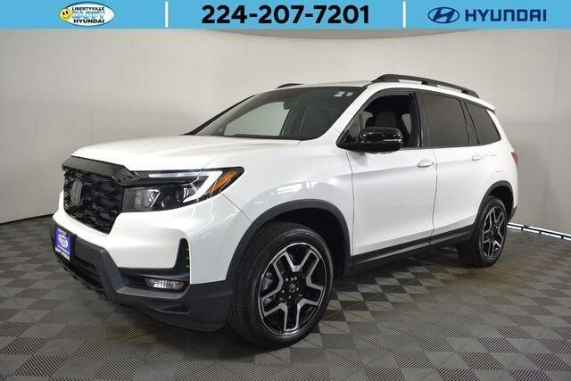 2023 Honda Passport Elite — photo 1 of 12