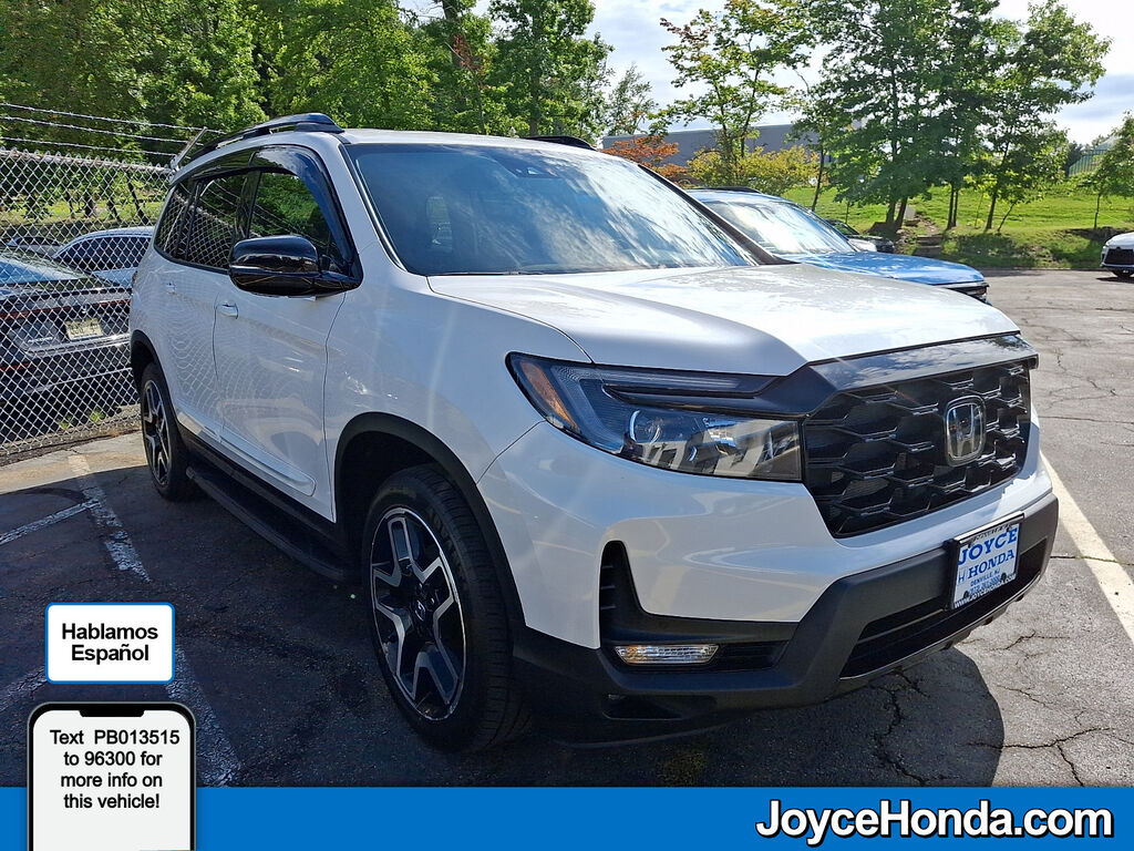 2023 Honda Passport AWD ELITE — photo 1 of 4