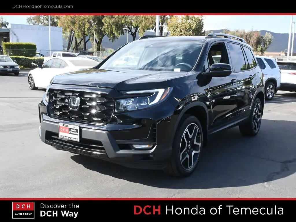 2023 Honda Passport Elite — photo 1 of 13