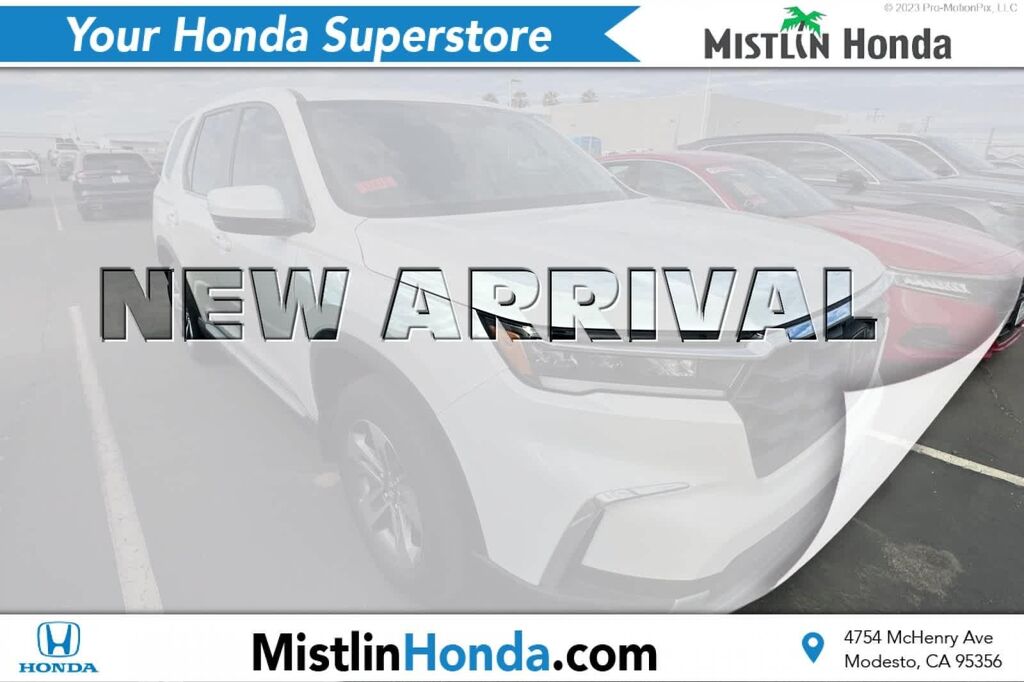 2023 Honda Pilot EX-L w/Rear Captain's Chairs — photo 1 of 29