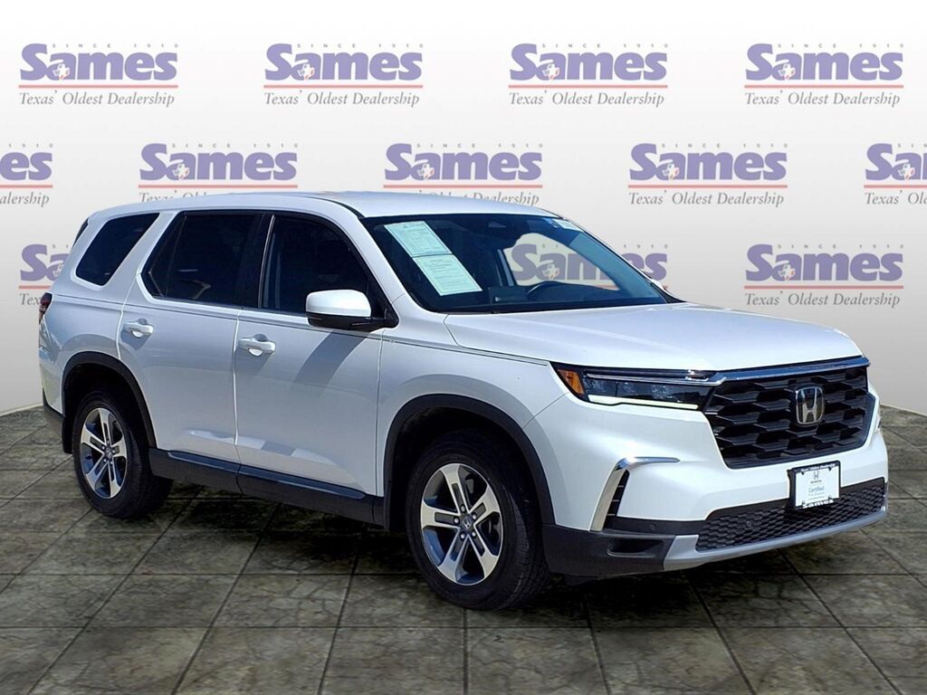 2023 Honda Pilot EX-L w/Rear Captain's Chairs — photo 1 of 13