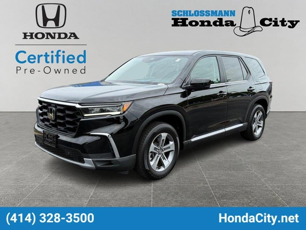 2024 Honda Pilot EX-L w/Rear Captain's Chairs — photo 1 of 13