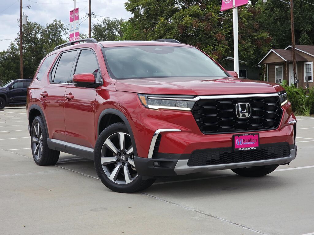 2024 Honda Pilot Touring — photo 1 of 13