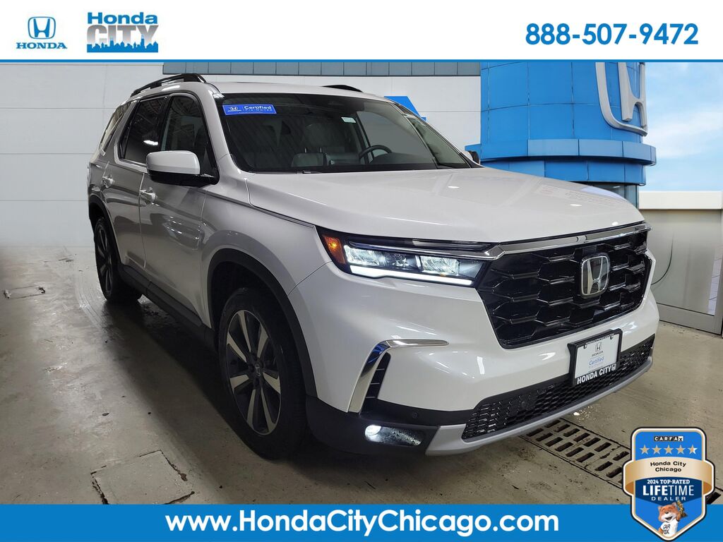 2025 Honda Pilot Touring — photo 1 of 6