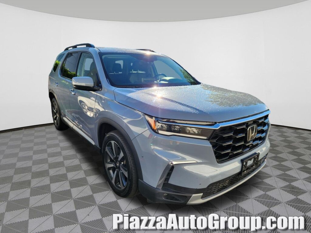 2024 Honda Pilot AWD TRG — photo 1 of 5