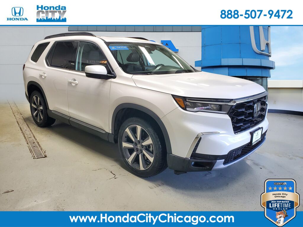 2024 Honda Pilot Touring — photo 1 of 6