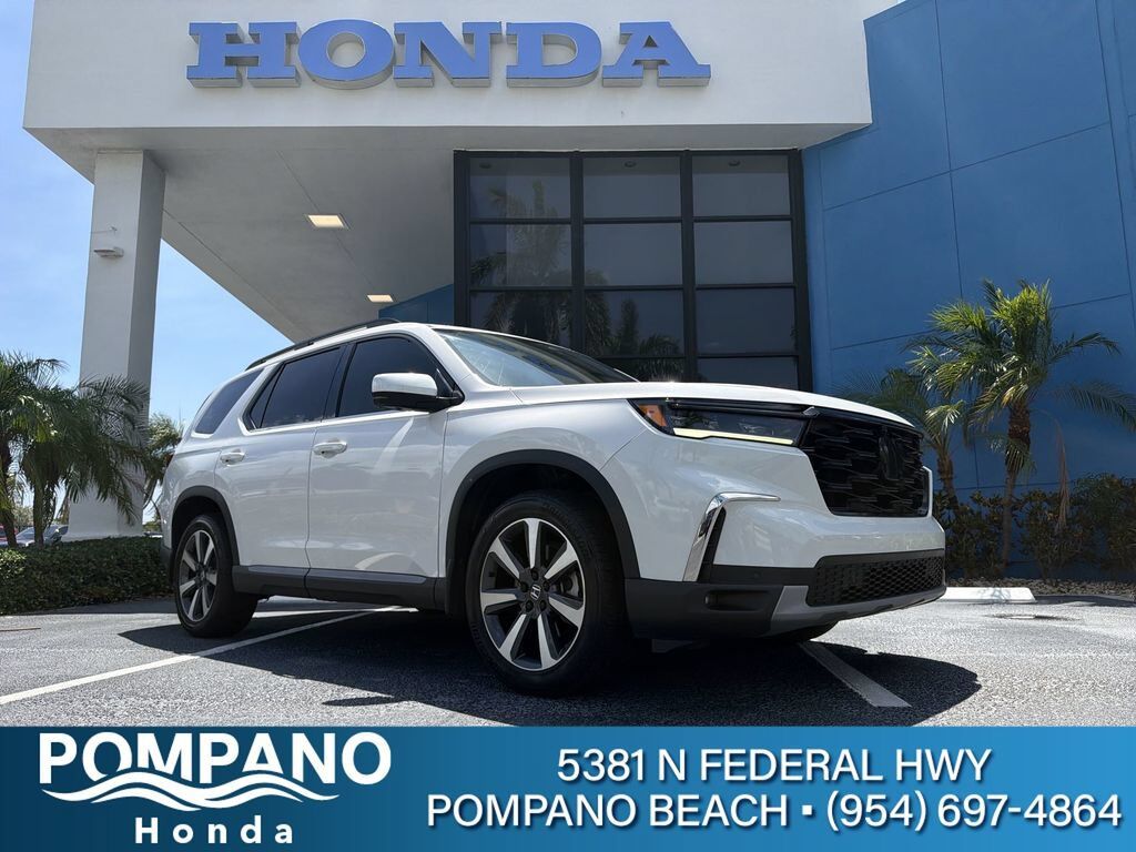 2023 Honda Pilot AWD ELITE — photo 1 of 7