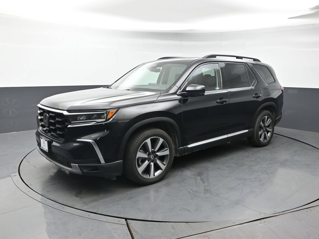 2023 Honda Pilot AWD ELITE — photo 1 of 7
