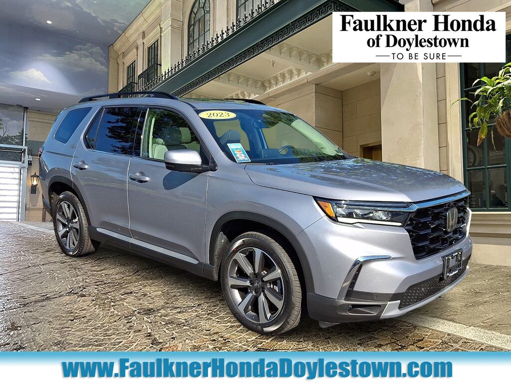 2023 Honda Pilot AWD ELITE — photo 1 of 7
