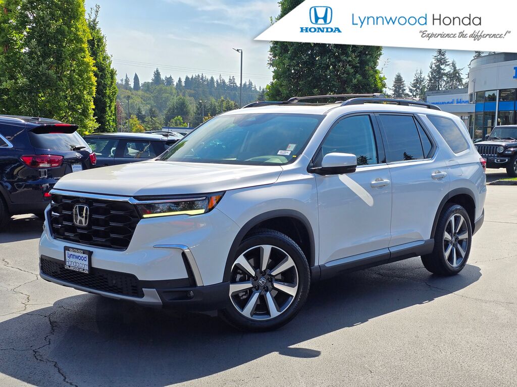 2024 Honda Pilot AWD ELITE — photo 1 of 7