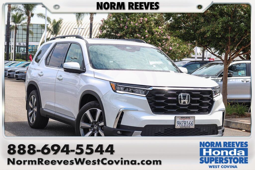 2023 Honda Pilot AWD ELITE — photo 1 of 6