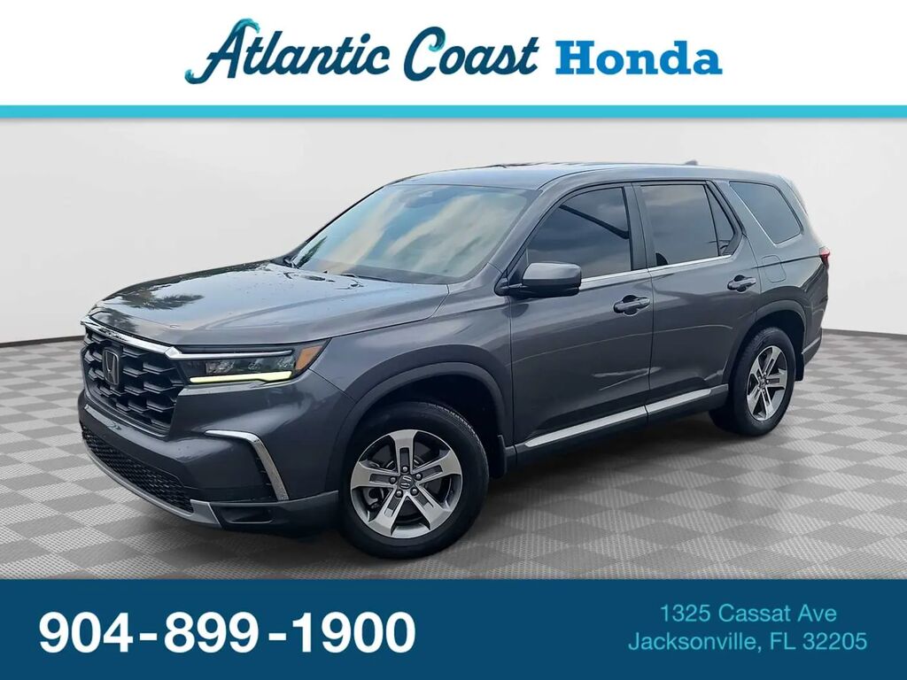 2023 Honda Pilot EX-L w/Rear Captain's Chairs — photo 1 of 13