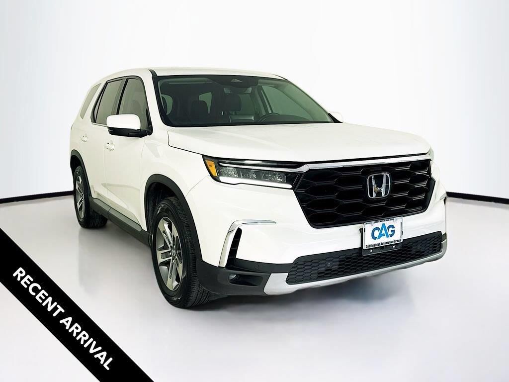 2023 Honda Pilot EX-L w/Rear Captain's Chairs — photo 1 of 6