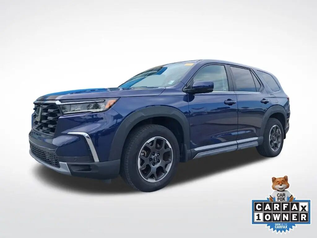 2023 Honda Pilot EX-L w/Rear Captain's Chairs — photo 1 of 13