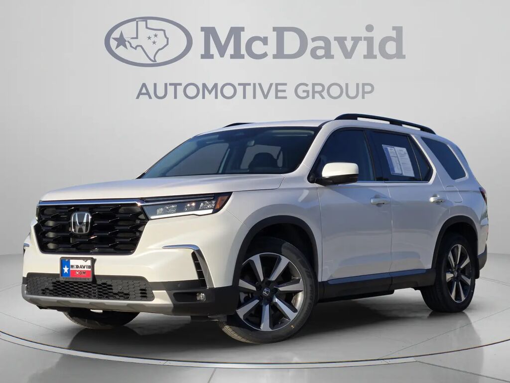 2025 Honda Pilot Touring — photo 1 of 13