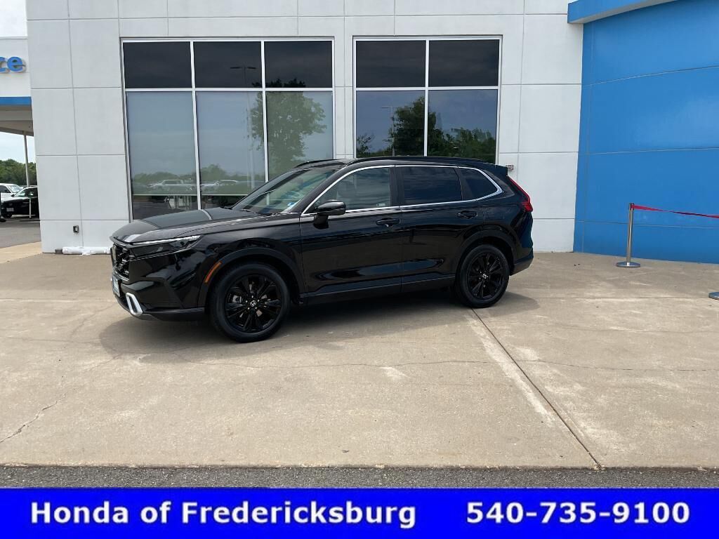 2025 Honda CR-V Hybrid Sport Touring — photo 1 of 13