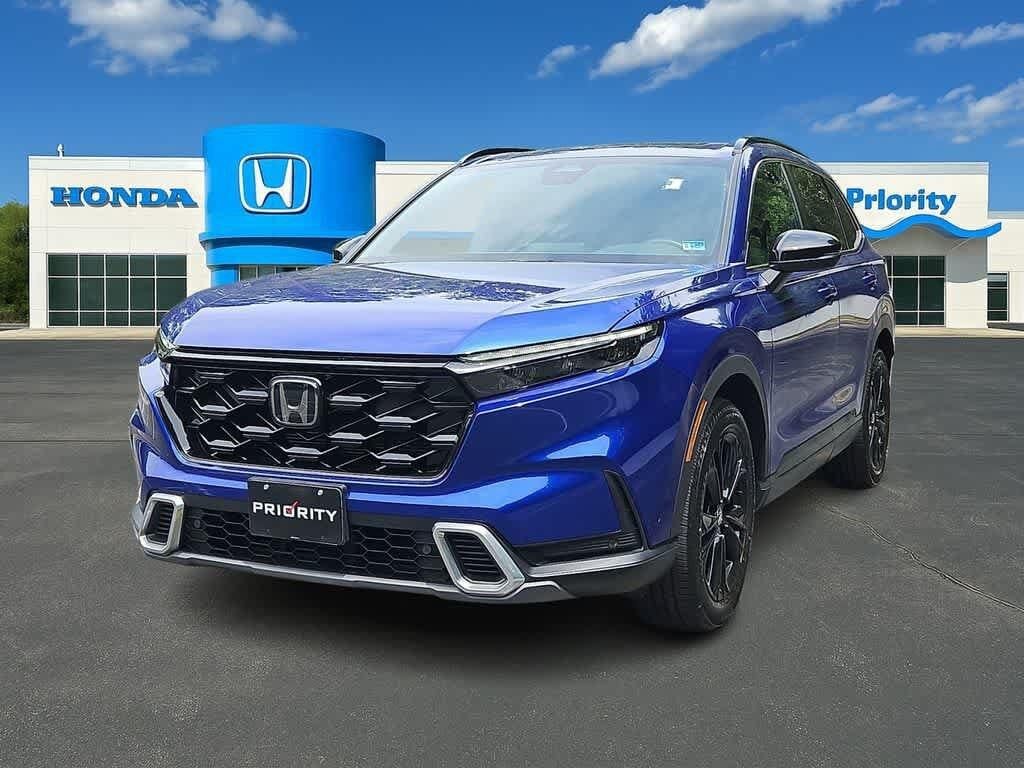 2023 Honda CR-V Hybrid Sport Touring — photo 1 of 13