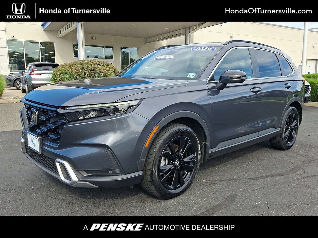 2024 Honda CR-V Hybrid HYBRID AWD SP TRG — photo 1 of 7